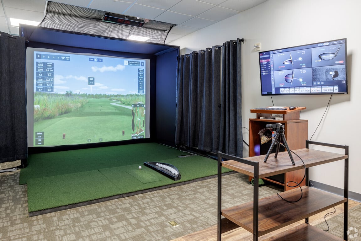 An interior shot of Golf Simulator / Conference Room 4