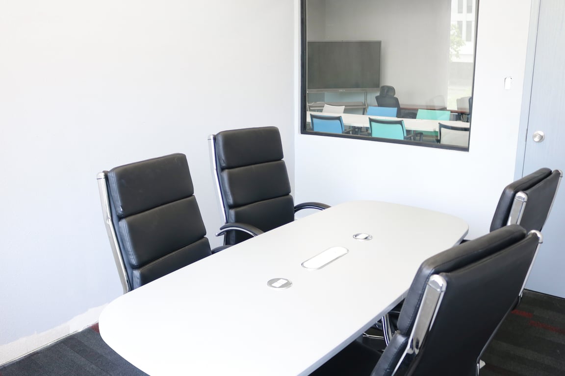 An interior shot of 4-6 Person Conference Room