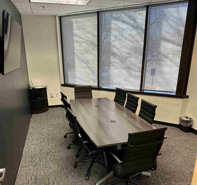 An interior shot of Small Conference Room with Monitor