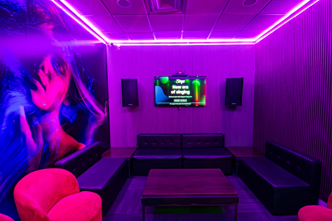 An interior shot of Private Karaoke and Meeting Suite 2 - Please note that while room is available for meeting space during the day, karaoke is only available M-F 6pm and later and on the weekends