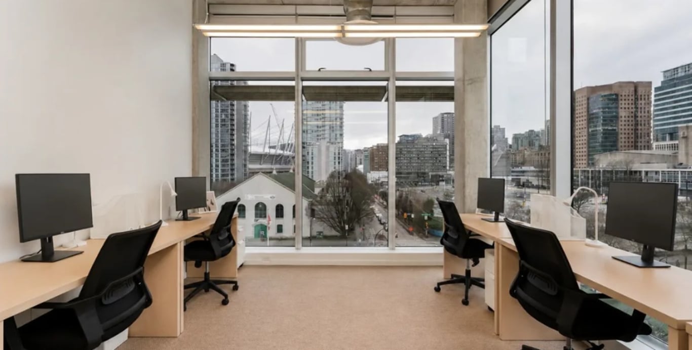 An interior shot of Day Pass - 4 Person Private Office (With Monitor)