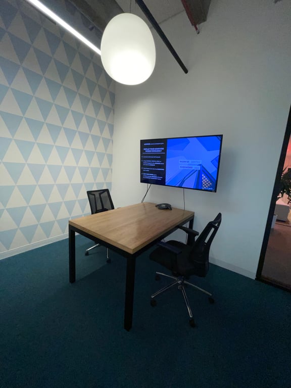 An interior shot of Huddle Room 1C