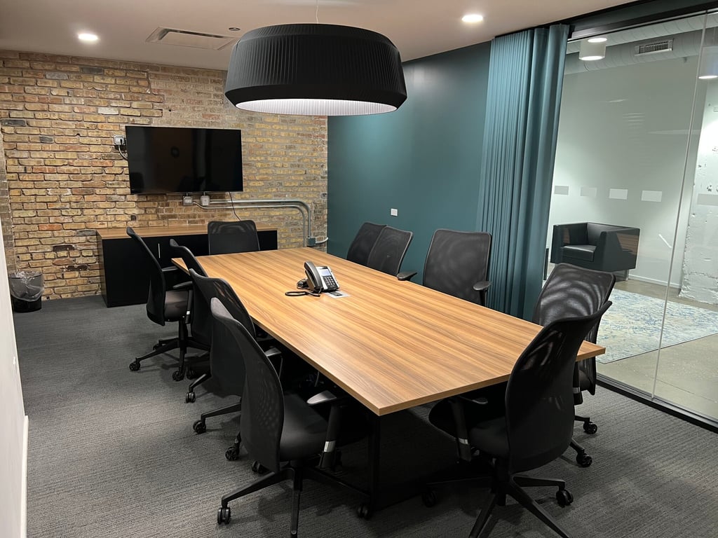 An interior shot of 10 Person Private Conference Room