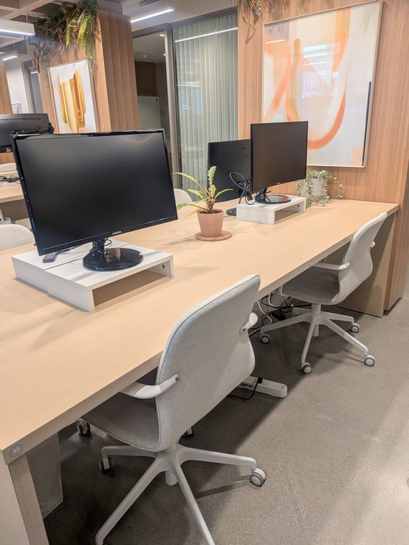 An interior shot of Day Pass - Dedicated Desk With Monitor