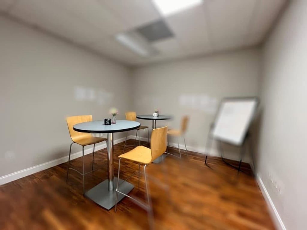 An interior shot of Think Tank Meeting Room with Whiteboard