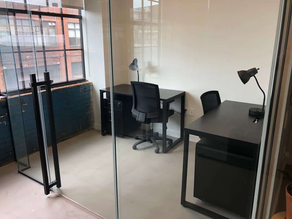 An interior shot of 2 Desk Interior Office