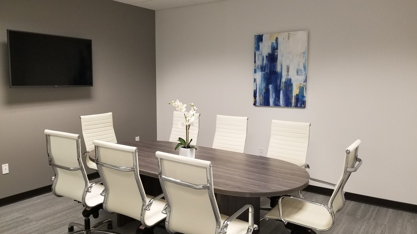 An interior shot of Centennial Room | Private 6 person meeting room
