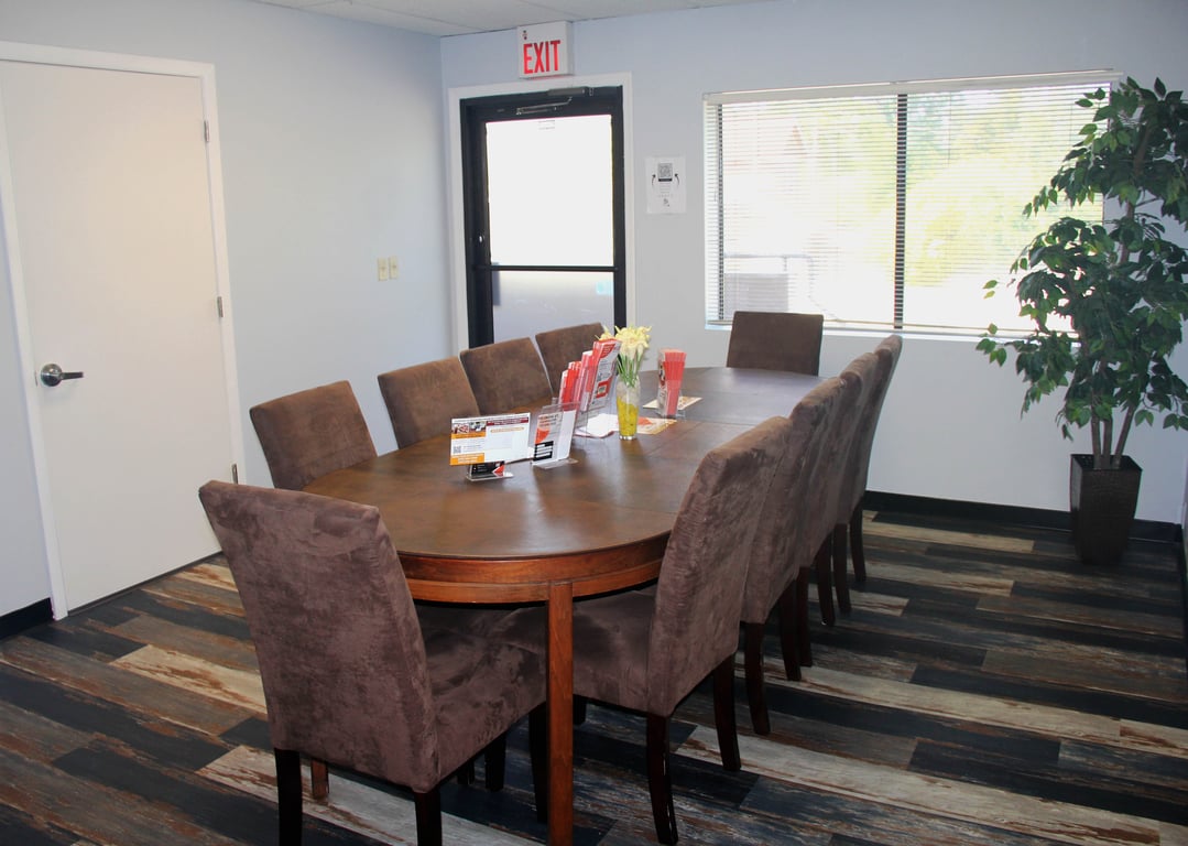 An interior shot of Open Conference Table for 8 Room #201 – Flexible Meeting Space for Collaboration & Productivity
