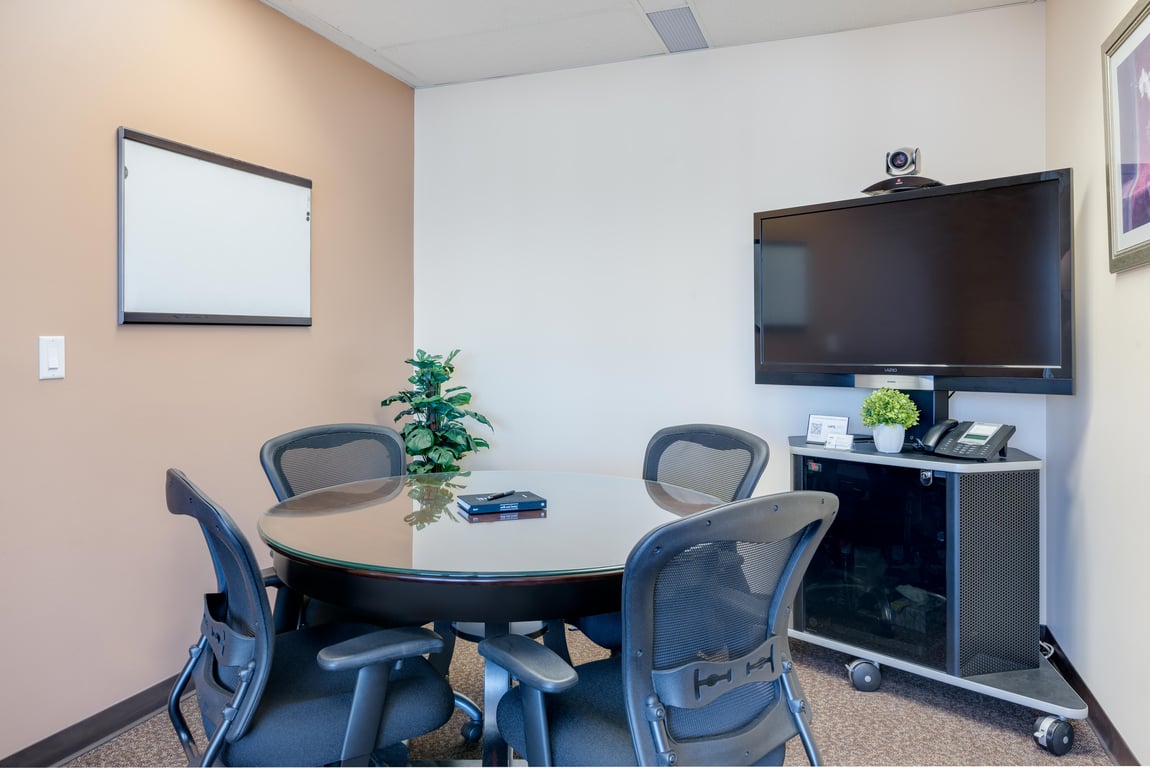 An interior shot of Centrally Located 4 Person Conference Room