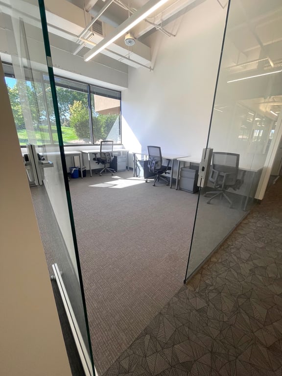 An interior shot of 4 person private office suite