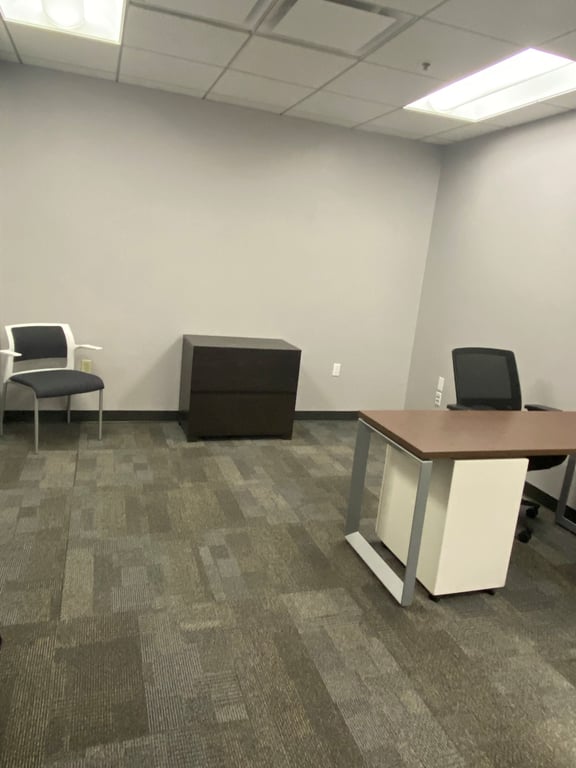 An interior shot of 2-3 Person Private Interior Office