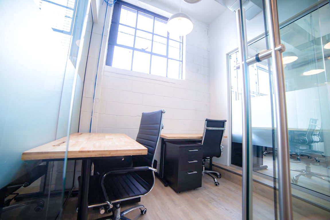 An interior shot of 2-Person Office With Window