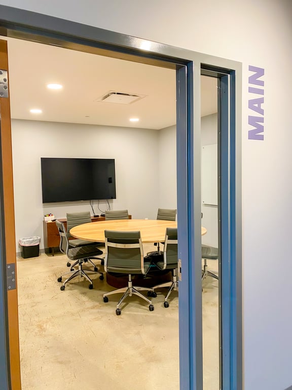 An interior shot of Main Conference Room (8 people)