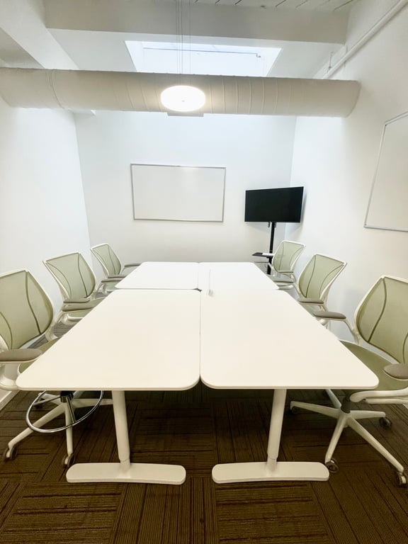 An interior shot of Medium Private Office (4-6 people)