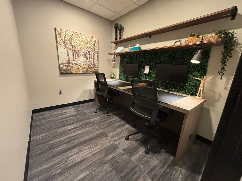An interior shot of Zoom Room / 1-2 Person Meeting Room