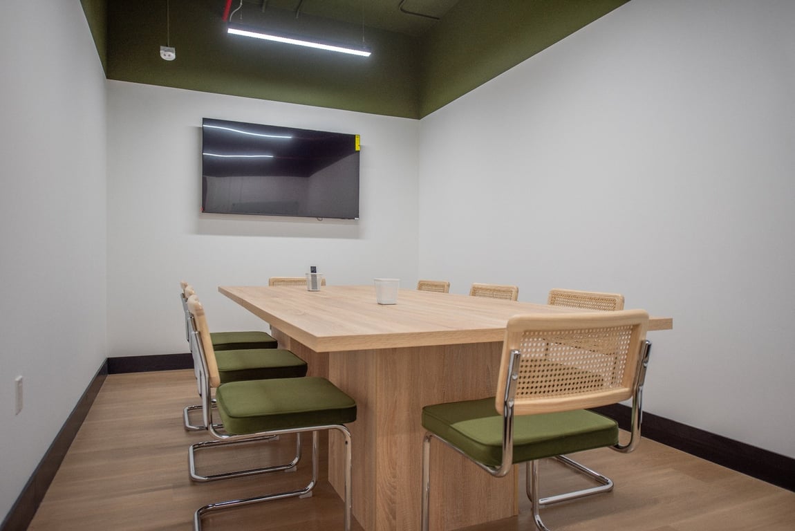An interior shot of Conference room 8 people