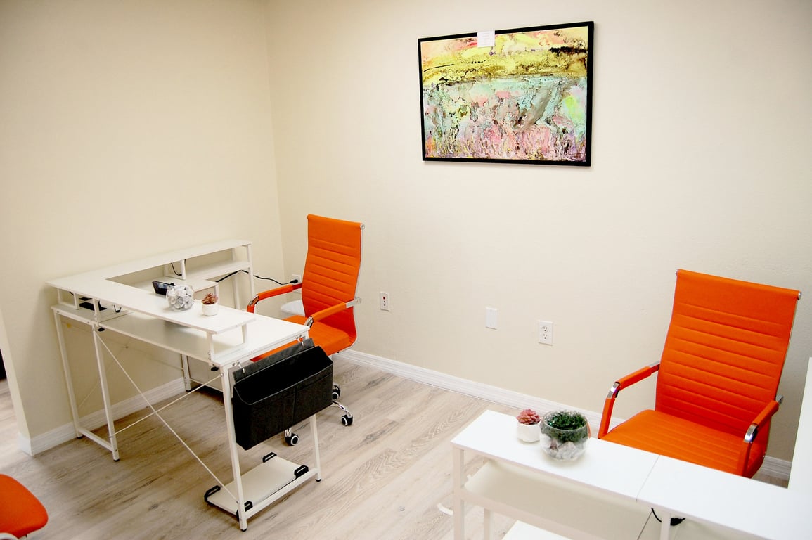 An interior shot of Designated Desk for 2 – Dual Desk Workspace - Room #104 | $100 | DAY PASS