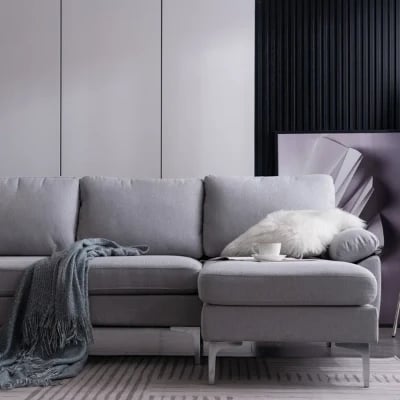 صورة مودين كنبة ركنية على شكل حرف الـ – بقاعدة من الخشب الطبيعي