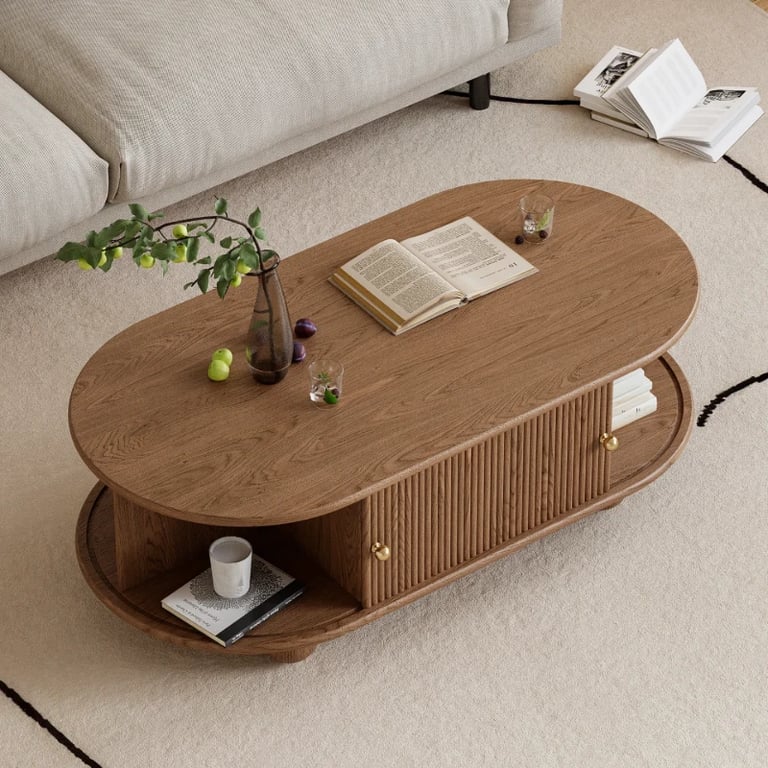 صورة طاولة قهوة توندو بيضاوية – خشب طبيعي مع تخزين وأرجل دائرية