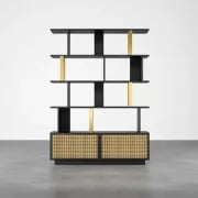 Mavrin Display Shelf – Black Wood with Gold & Rattan Accents