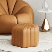 Maven – Upholstered ottoman with a simple and elegant design and a natural wood frame.