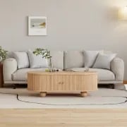 صورة طاولة قهوة توندو بيضاوية – خشب طبيعي مع تخزين وأرجل دائرية