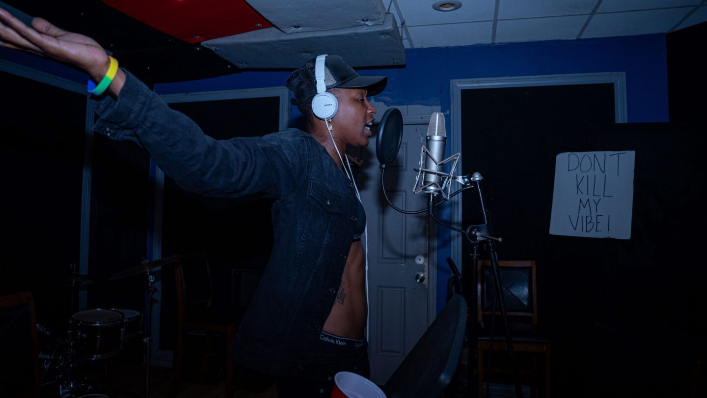 Rapper in studio singing