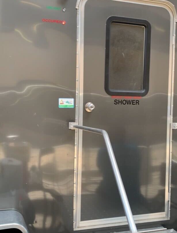 External shower door.