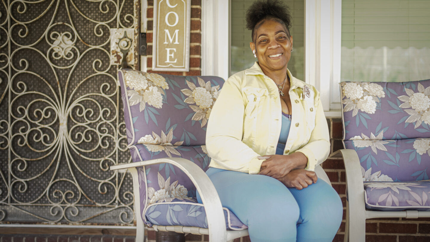 Woman sittin on porch