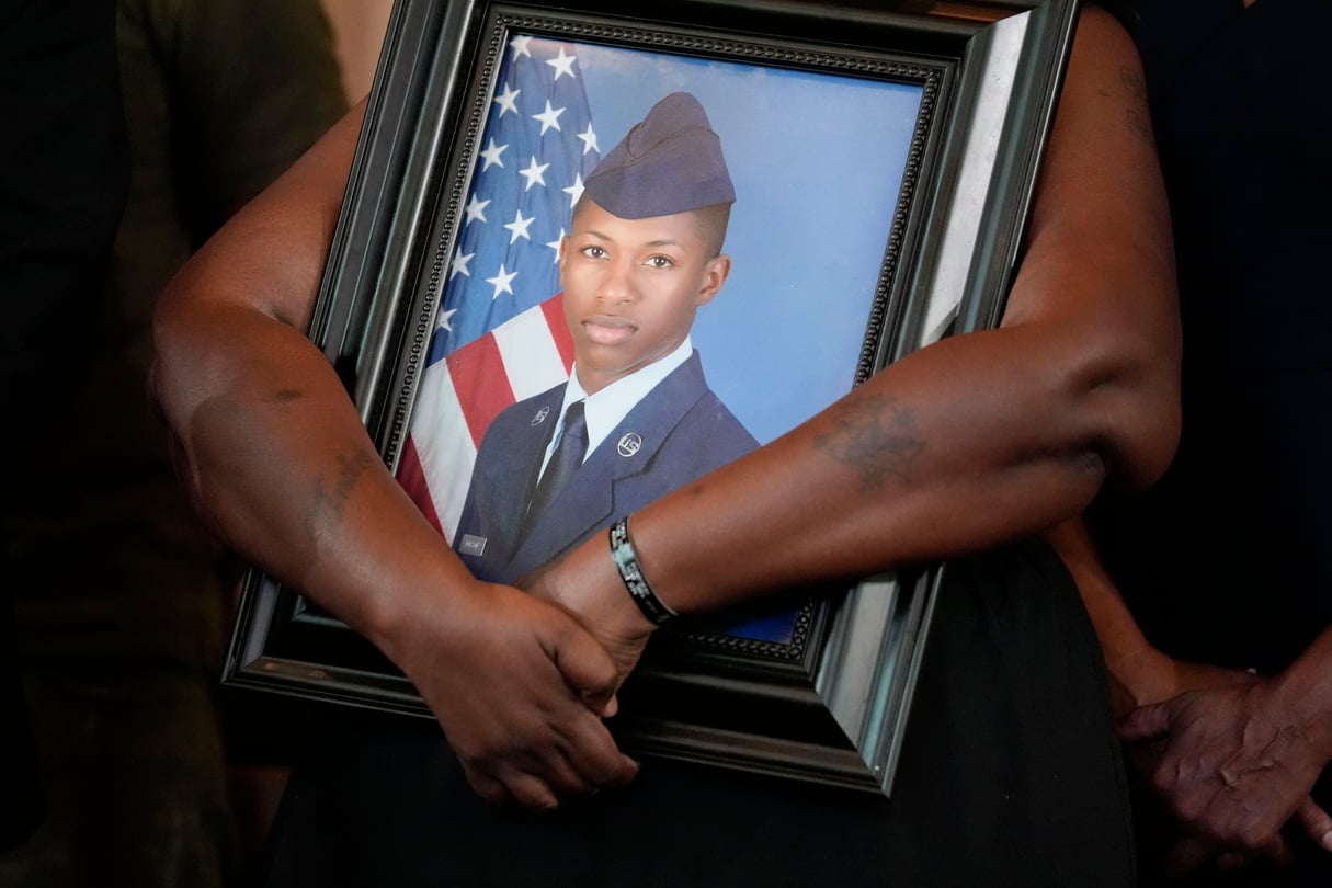 A former Florida sheriff's deputy charged with killing a Black U.S. Air Force senior airman from Atlanta who answered his apartment door while holding a gun pointed toward the ground was arrested Monday, officials said.