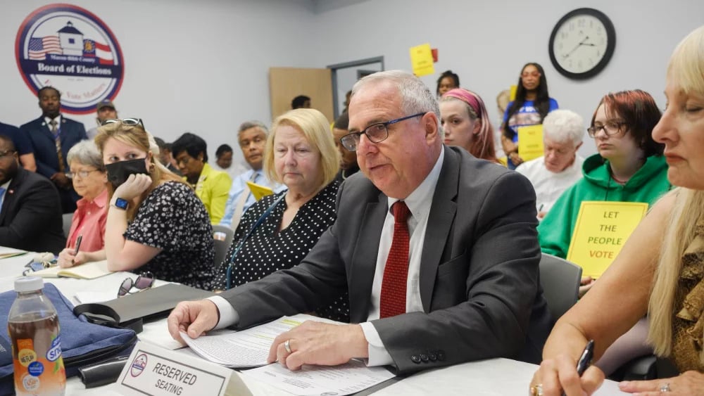There are concerns that a new data system pushed by conservative activists is fueling mass challenges that could kick legitimate voters off the rolls.