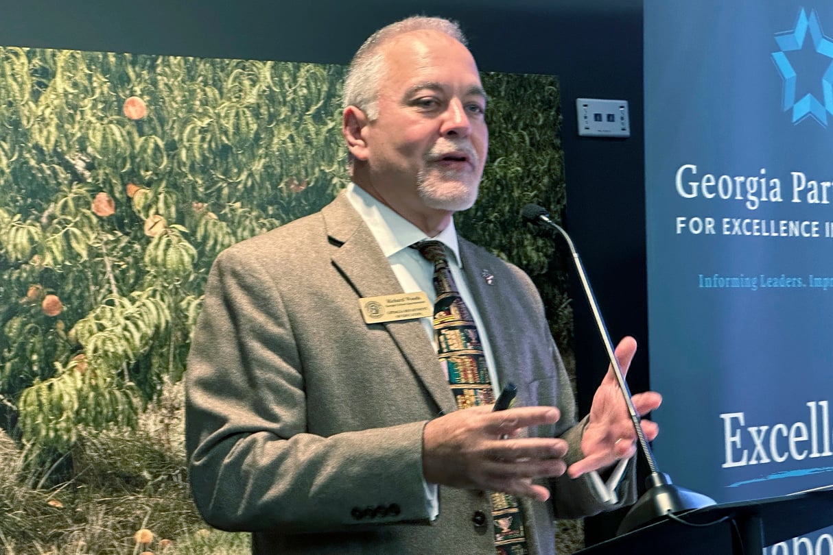 Georgia Superintendent of Schools Richard Woods speaks at a podium.