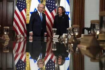 Vice President Kamala Harris, right, and Israeli Prime Minister Benjamin Netanyahu appear before a meeting at the Eisenhower Executive Office Building on the White House complex in Washington, Thursday, July 25, 2024. American and Israeli flags are behind them.
