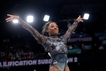 Simone Biles made her much-anticipated Paris Olympics debut on Sunday, Rafael Nadal won his singles match and the U.S. men's basketball team beat Serbia.