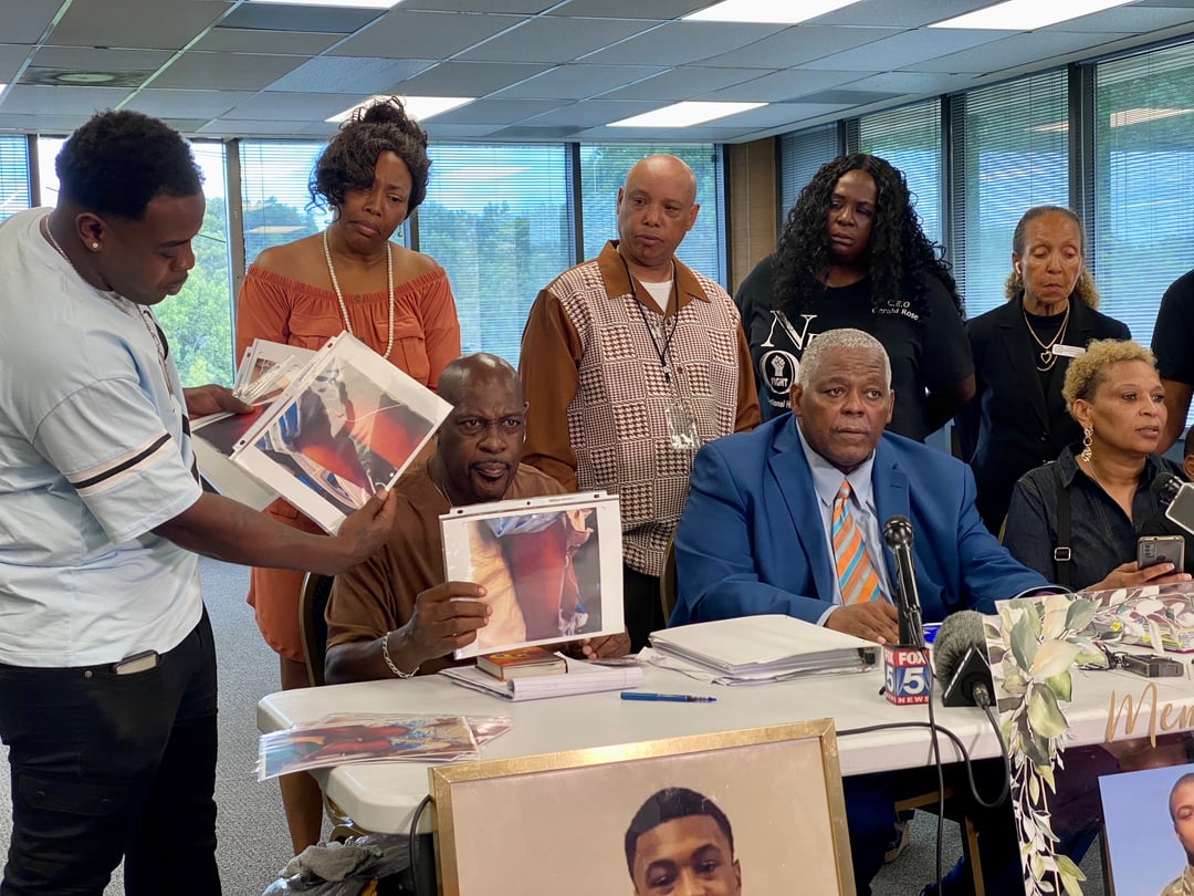 The family of U.S. Army veteran Christon Collins shows multiple photos of the bruises on his body at a press conference.