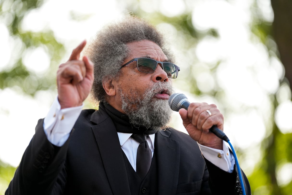 Cornel West speaks into a microphone.