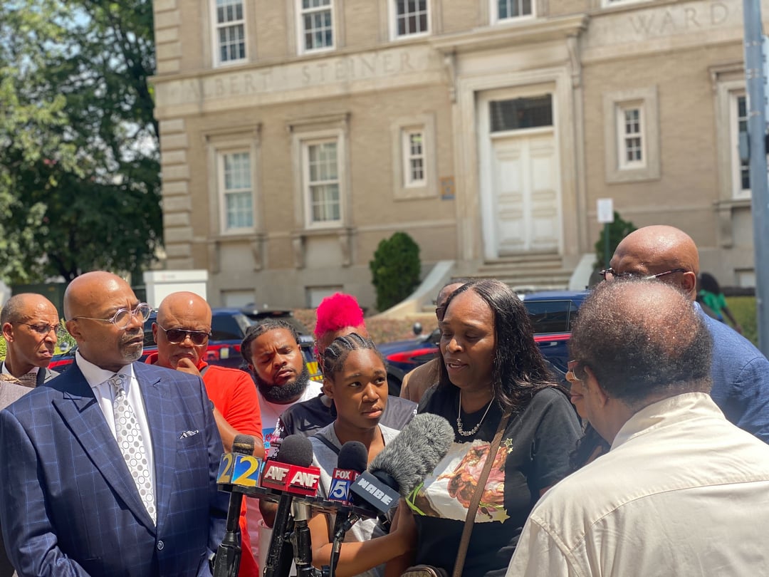 Tabatha Colzie, the mother of a 29-year-old woman who was shot in the head at a block party in Mechanicsville, speaks at a press conference outside Grady Memorial Hospital.
