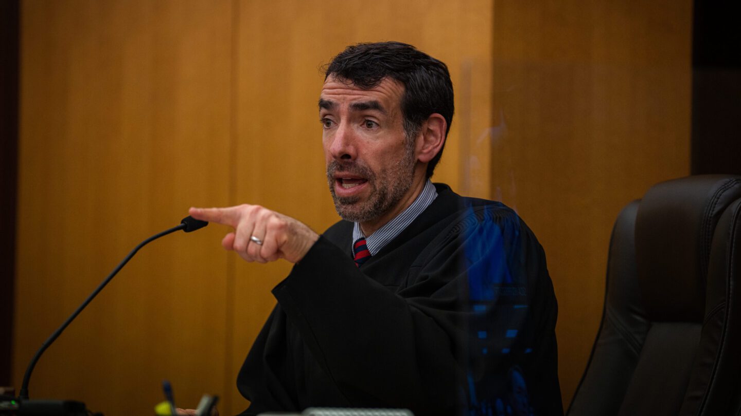 Fulton County Superior Court Judge Robert McBurney speaks into a microphone.
