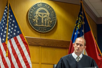 Fulton County Superior Judge Scott McAfee sits in court.