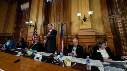 Georgia's State Election Board members discuss proposals for election rule changes at the state Capitol