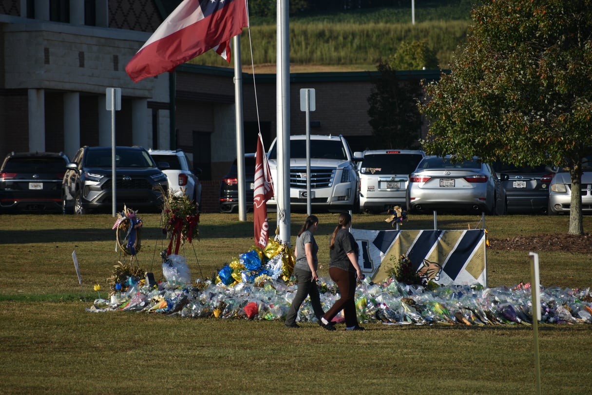 A vigil around the flag pole at Apalachee High School.