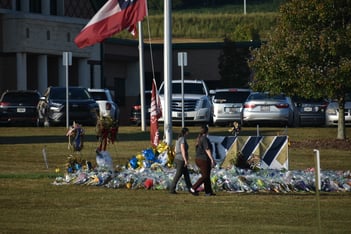 A vigil around the flag pole at Apalachee High School.