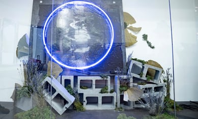 A ring of blue light around a collection of industrial materials