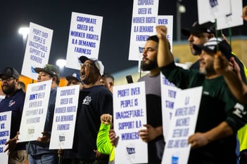 U.S. ports from Georgia to Maine shut down Tuesday when the union representing about 45,000 dockworkers went on strike for the first time since 1977.