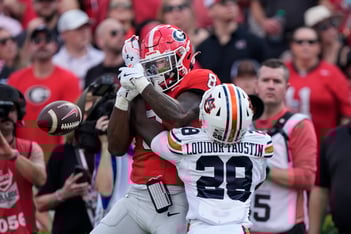 Auburn safety Kensley Louidor-Faustin breaks up a pass intended for Georgia wide receiver Colbie Young in the first half of an NCAA college football game Saturday, Oct. 5, 2024, in Athens, Ga.
