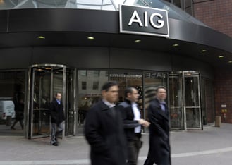 The AIG building in New York with two revolving doors.