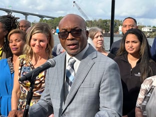 Georgia State Sen. Harold Jones of Augusta speaks at a news conference outdoors.