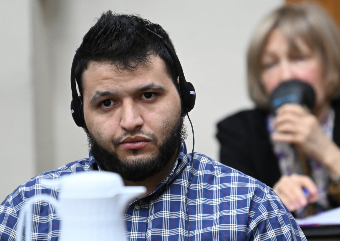 Jose Ibarra, accused of killing a Georgia nursing student earlier this year, listens through an interpreter during his trial.