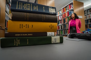 A stack of books in a library.