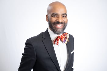 A headshot of Tolton Pace.